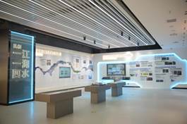 A room with a large display Description automatically generated with medium confidence